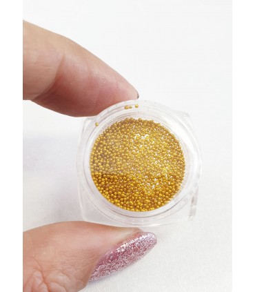 نگین ناخن طرح مروارید طلایی نزدیک