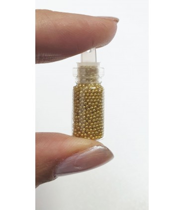 نگین ناخن طرح مروارید طلایی کوچک  نزدیک