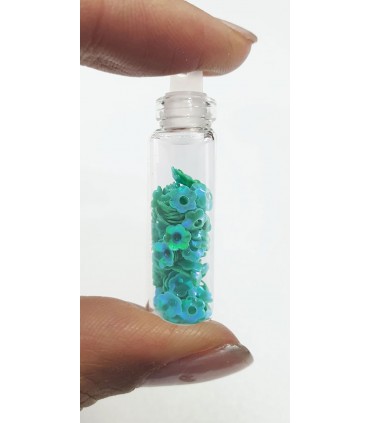 نگین ناخن طرح گل سبز تیره با دست